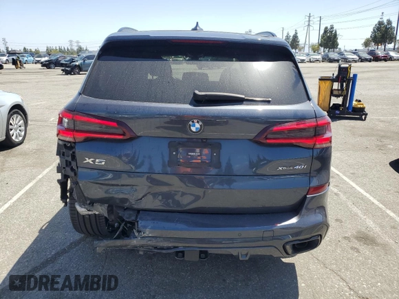 2021 BMW X5 xDrive40i with VIN 5UXCR6C06M9H65380, listed as a Copart auction lot 57445405 with 33,916 mi miles and Salvage title. Bid and sale history available at DreamBid. Image 6.