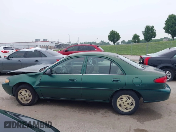 1999 Ford Escort LX z VIN 1FAFP10P1XW230023, wystawiony jako IAAI lot #42486934 z przebiegiem 41 468 mil mil oraz . Historia ofert i sprzedaży dostępna na DreamBid. Obrazek 14.