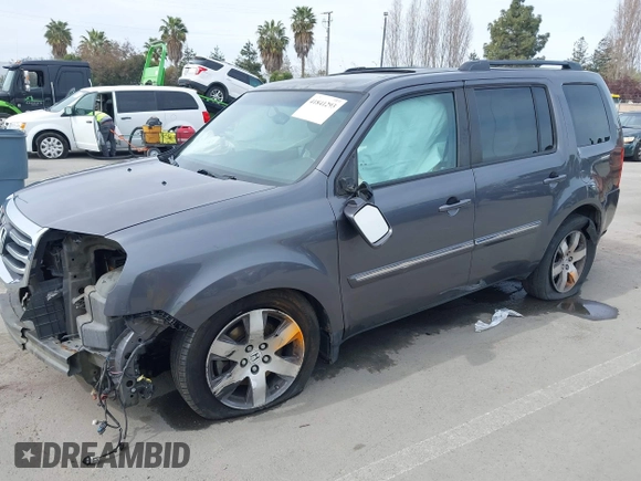 2015 Honda Pilot Touring with VIN 5FNYF3H91FB011847, listed as a IAAI auction lot 41841293 with 99,431 mi miles. Bid and sale history available at carsss.com. Image 2.