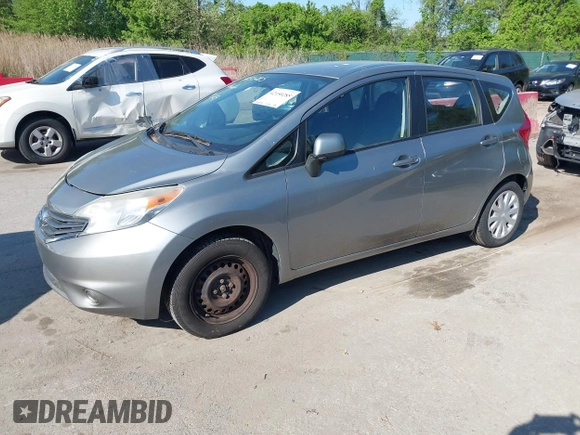 2014 Nissan Note SV with VIN 3N1CE2CP0EL404867, listed as a IAAI auction lot 42150285 with 124,370 mi miles and . Bid and sale history available at DreamBid. Image 2.