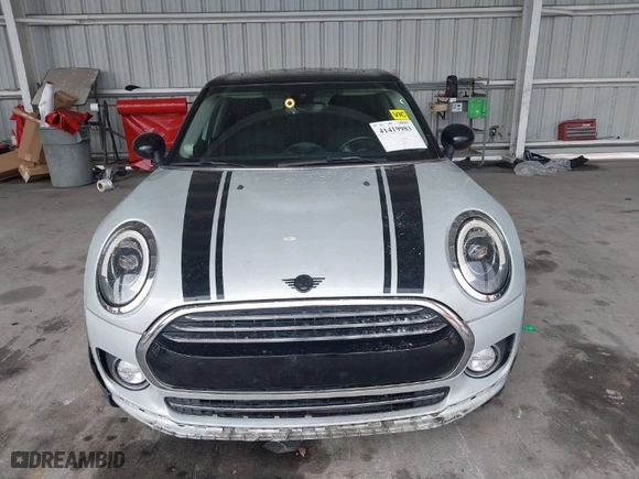 2019 MINI Cooper Clubman with VIN WMWLN5C53K2E34830, listed as a IAAI auction lot 41419983 with 64,716 mi miles. Bid and sale history available at carsss.com. Image 12.