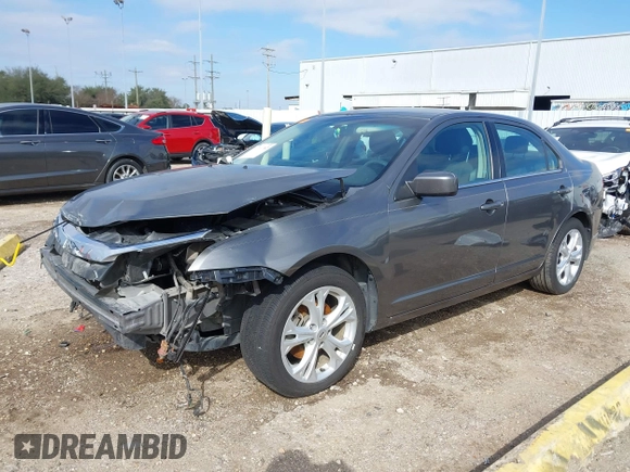 2012 Ford Fusion SE z VIN 3FAHP0HG0CR436745, wystawiony jako IAAI lot #41598812 z przebiegiem 116 305 mil mil oraz . Historia ofert i sprzedaży dostępna na DreamBid. Obrazek 19.