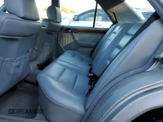 1993 Mercedes-Benz E Class with VIN WDBEA32E9PB936886, listed as a Copart auction lot 86800894 with 115,217 mi miles and Salvage Title. Bid and sale history available at carsss.com. Image 10.