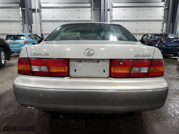 1998 Lexus ES 300 Luxury Sport Sdn with VIN JT8BF28G9W0105650, listed as a Copart auction lot 47545945 with 254,311 mi miles and Salvage Title. Bid and sale history available at carsss.com. Image 6.
