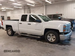 2014 Chevrolet Silverado 1500 LT with VIN 1GCVKREC3EZ106310, listed as a IAAI auction lot 40752259 with 162,397 mi miles and . Bid and sale history available at DreamBid. Image 14.