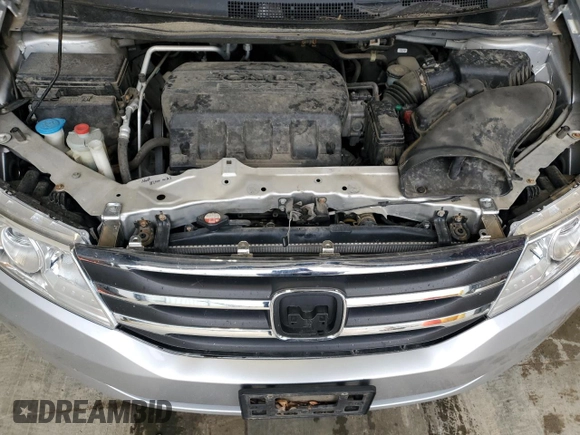 2012 Honda Odyssey EX-L with VIN 5FNRL5H65CB141026, listed as a Copart auction lot 54247635 with 107,679 mi miles and Non Repairable. Bid and sale history available at carsss.com. Image 12.
