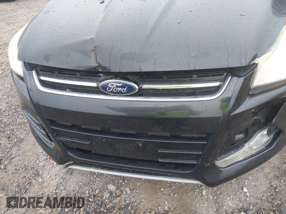 2014 Ford Escape Titanium with VIN 1FMCU9J90EUC24898, listed as a IAAI auction lot 42166523 with 152,464 mi miles and . Bid and sale history available at DreamBid. Image 6.