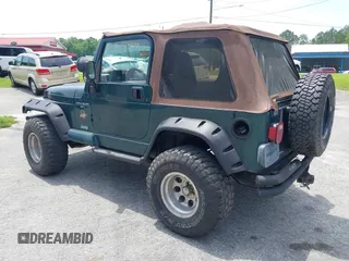 2000 Jeep Wrangler Sahara with VIN 1J4FA59S8YP722208, listed as a IAAI auction lot 42294978 with 238,024 mi miles and . Bid and sale history available at DreamBid. Image 3.