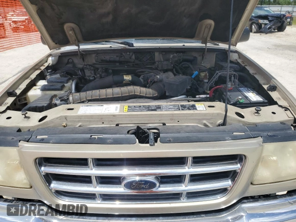 2001 Ford Ranger XL z VIN 1FTYR14V91TA90205, wystawiony jako Copart lot #55434505 z przebiegiem 205 919 mil mil oraz Szkoda całkowita • Salvage title. Historia ofert i sprzedaży dostępna na DreamBid. Obrazek 11.