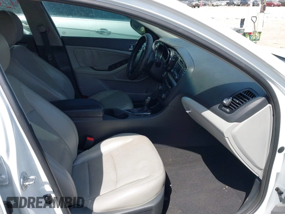 2013 Kia Optima EX with VIN 5XXGN4A72DG257698, listed as a IAAI auction lot 42056867 with 153,846 mi miles and . Bid and sale history available at DreamBid. Image 5.