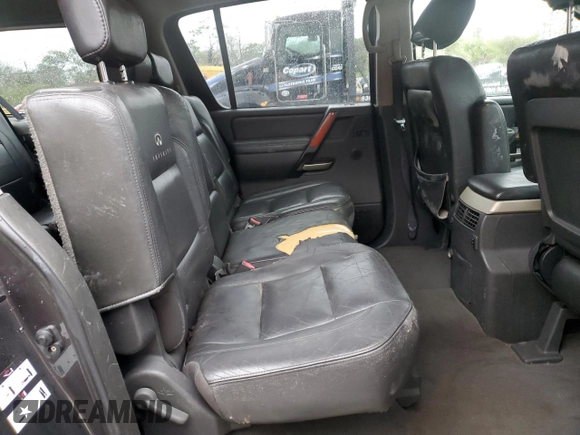 2006 Infiniti QX56 z VIN 5N3AA08A96N800292, wystawiony jako Copart lot #42050855 z przebiegiem 305 926 mil mil oraz Czysty tytuł • Clean title. Historia ofert i sprzedaży dostępna na DreamBid. Obrazek 11.