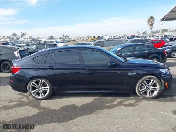 2014 BMW 5 Series Gran Turismo 535i with VIN WBA5M2C50ED085531, listed as a IAAI auction lot 41233748 with 115,550 mi miles. Bid and sale history available at carsss.com. Image 13.