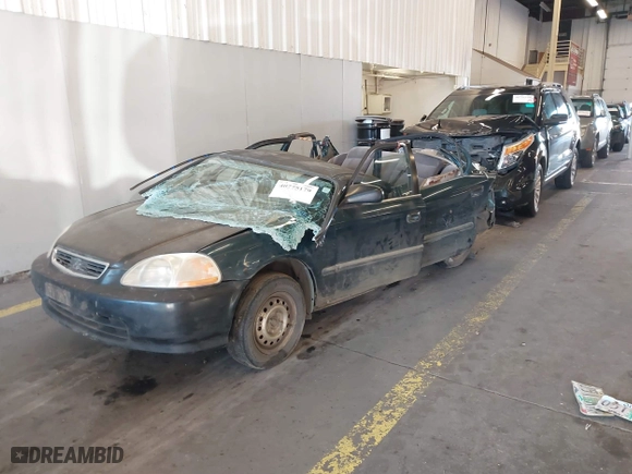 1996 Honda Civic DX with VIN 1HGEJ6625TL019386, listed as a IAAI auction lot 40775179 with 212,267 mi miles. Bid and sale history available at carsss.com. Image 18.