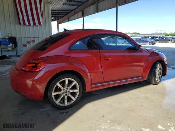 2012 Volkswagen Beetle 2.5L with VIN 3VWJX7AT7CM662822, listed as a Copart auction lot 74215804 with 115,890 mi miles and Salvage Title. Bid and sale history available at carsss.com. Image 3.