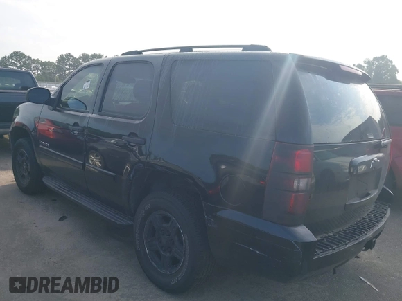 2008 Chevrolet Tahoe LS with VIN 1GNFC13C38R237657, listed as a IAAI auction lot 42620061 with 290,899 mi miles and . Bid and sale history available at DreamBid. Image 3.