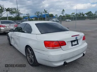 2007 BMW 3 Series 335i with VIN WBAWL73567PX46744, listed as a IAAI auction lot 39120411 with 159,526 mi miles. Bid and sale history available at carsss.com. Image 3.