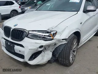 2017 BMW X4 M40i with VIN 5UXXW7C59H0M91384, listed as a IAAI auction lot 41883585 with 163,547 mi miles. Bid and sale history available at carsss.com. Image 6.