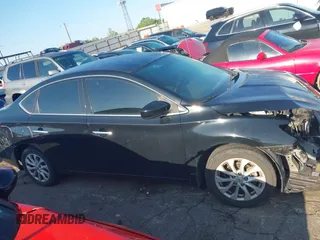 2019 Nissan Sentra S with VIN 3N1AB7AP5KY376921, listed as a IAAI auction lot 41977915 with 90,700 mi miles and . Bid and sale history available at DreamBid. Image 14.