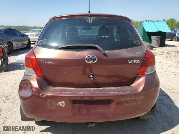 2009 Toyota Yaris with VIN JTDJT903695246609, listed as a Copart auction lot 52913055 with 234,331 mi miles and Clean Title. Bid and sale history available at carsss.com. Image 6.