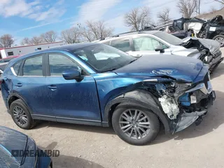 2018 Mazda CX-5 Sport with VIN JM3KFBBM8J0400741, listed as a IAAI auction lot 41860323 with 54,911 mi miles. Bid and sale history available at carsss.com. Image 13.