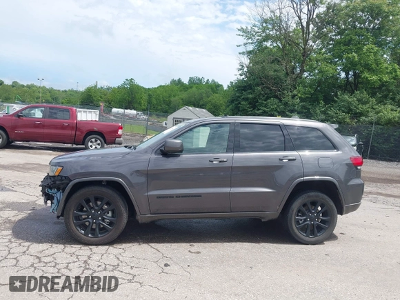 2021 Jeep Grand Cherokee Laredo X with VIN 1C4RJFAG6MC774728, listed as a IAAI auction lot 42270184 with 27,021 mi miles and . Bid and sale history available at DreamBid. Image 14.