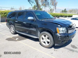 2013 Chevrolet Suburban LTZ with VIN 1GNSCKE02DR134442, listed as a IAAI auction lot 41880093 with 204,892 mi miles and . Bid and sale history available at DreamBid. Image 1.