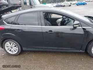 2015 Ford Focus Titanium with VIN 1FADP3N2XFL300859, listed as a IAAI auction lot 41944410 with 76,194 mi miles. Bid and sale history available at carsss.com. Image 14.