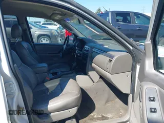 2002 Jeep Grand Cherokee Laredo with VIN 1J4GW48SX2C247709, listed as a IAAI auction lot 42444030 with 196,591 mi miles and . Bid and sale history available at DreamBid. Image 5.