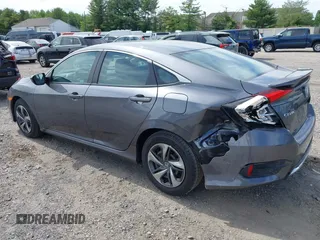 2021 Honda Civic LX with VIN 2HGFC2F65MH525423, listed as a IAAI auction lot 42319862 with 37,248 mi miles and . Bid and sale history available at DreamBid. Image 3.