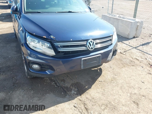 2012 Volkswagen Tiguan S with VIN WVGBV7AX2CW566981, listed as a IAAI auction lot 42069748 with 153,613 mi miles and . Bid and sale history available at DreamBid. Image 18.