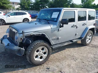2015 Jeep Wrangler Unlimited Sahara with VIN 1C4BJWEG9FL570780, listed as a IAAI auction lot 42474940 with 116,226 mi miles and . Bid and sale history available at DreamBid. Image 18.