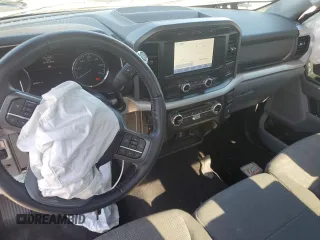 2022 Ford F-150 XL with VIN 1FTMF1E51NKD59265, listed as a Copart auction lot 77193424 with 38,590 mi miles and Salvage Title. Bid and sale history available at DreamBid. Image 8.