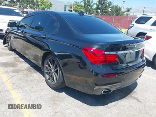 2014 BMW 7 Series ALPINA B7 z VIN WBAYE8C54ED134615, wystawiony jako IAAI lot #42197002 z przebiegiem 126 805 mil mil oraz . Historia ofert i sprzedaży dostępna na DreamBid. Obrazek 3.