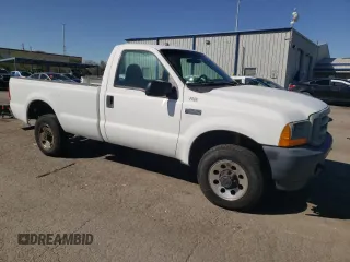 2001 Ford F-250 XL z VIN 1FTNF21L31EC98816, wystawiony jako Copart lot #72825944 z przebiegiem 145 083 mil mil oraz Szkoda całkowita • Salvage title. Historia ofert i sprzedaży dostępna na DreamBid. Obrazek 4.
