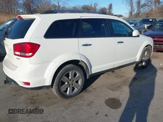2013 Dodge Journey Crew with VIN 3C4PDCDG3DT521556, listed as a IAAI auction lot 41852888 with 209,562 mi miles and . Bid and sale history available at DreamBid. Image 4.