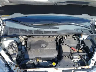 2011 Toyota Sienna XLE AAS with VIN 5TDYK3DC7BS054012, listed as a IAAI auction lot 41752182 with 123,226 mi miles and . Bid and sale history available at DreamBid. Image 10.