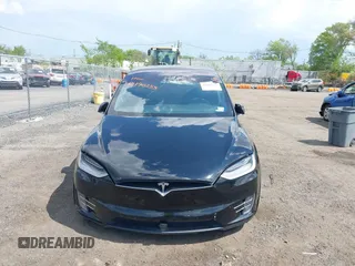 2019 Tesla Model X 75D with VIN 5YJXCBE21KF180203, listed as a IAAI auction lot 42190255 with 114,294 mi miles and . Bid and sale history available at carsss.com. Image 6.