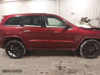2018 Jeep Grand Cherokee Laredo E with VIN 1C4RJFAG9JC436803, listed as a IAAI auction lot 41572437 with 106,941 mi miles. Bid and sale history available at carsss.com. Image 13.