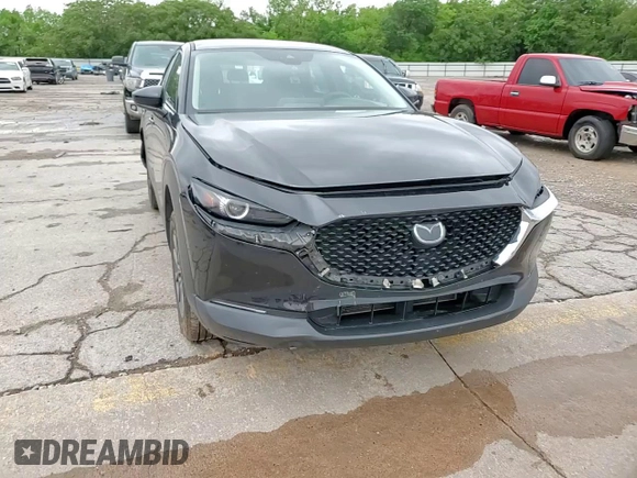 2021 Mazda CX-30 S with VIN 3MVDMAAL5MM303863, listed as a Copart auction lot 54946935 with 71,968 mi miles and Salvage title. Bid and sale history available at DreamBid. Image 14.