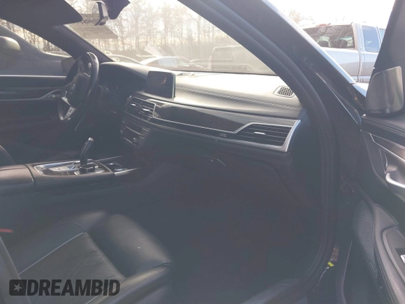 2019 BMW 7 Series 750i xDrive with VIN WBA7F2C52KB240302, listed as a IAAI auction lot 40984933 with 93,737 mi miles and . Bid and sale history available at DreamBid. Image 5.