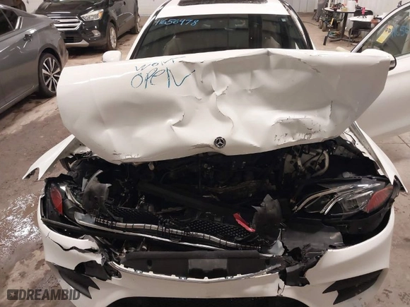 2017 Mercedes-Benz E-Class E 300 Luxury with VIN WDDZF4KB3HA233328, listed as a IAAI auction lot 41656478 with 77,509 mi miles. Bid and sale history available at carsss.com. Image 10.