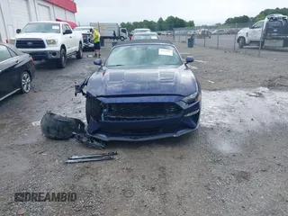 2020 Ford Mustang EcoBoost z VIN 1FATP8UH8L5106720, wystawiony jako IAAI lot #42128952 z przebiegiem 102 234 mil mil oraz . Historia ofert i sprzedaży dostępna na DreamBid. Obrazek 13.