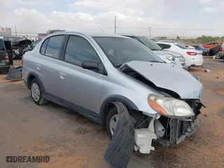 2001 Toyota ECHO with VIN JTDBT123010148678, listed as a IAAI auction lot 39651919 with 87,835 mi miles. Bid and sale history available at carsss.com. Image 1.
