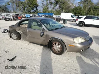 2004 Mercury Sable GS z VIN 1MEFM50U24A617431, wystawiony jako Copart lot #88352715 z przebiegiem 141 457 mil mil oraz Szkody całkowita. Historia ofert i sprzedaży dostępna na DreamBid. Obrazek 4.