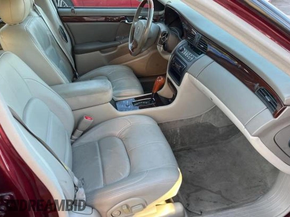 2002 Cadillac DeVille DTS with VIN 1G6KF57912U135771, listed as a Copart auction lot 82052554 with 56,268 mi miles and Clean Title. Bid and sale history available at carsss.com. Image 5.
