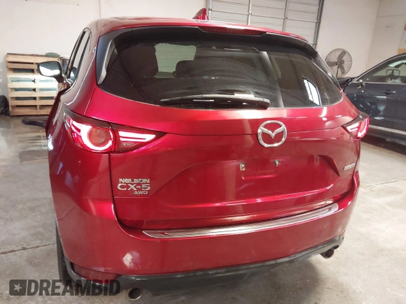 2020 Mazda CX-5 Grand Touring with VIN JM3KFBDM1L1809951, listed as a IAAI auction lot 41345854 with 117,376 mi miles. Bid and sale history available at carsss.com. Image 17.