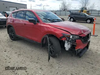 2022 Mazda CX-5 2.5 Turbo with VIN JM3KFBAY4N0547987, listed as a Copart auction lot 52541315 with 9,652 mi miles and Salvage Title. Bid and sale history available at carsss.com. Image 4.