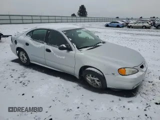 2004 Pontiac Grand Am SE1 with VIN 1G2NF52E24M543363, listed as a Copart auction lot 83989194 with 113,601 mi miles and Salvage Title. Bid and sale history available at carsss.com. Image 4.