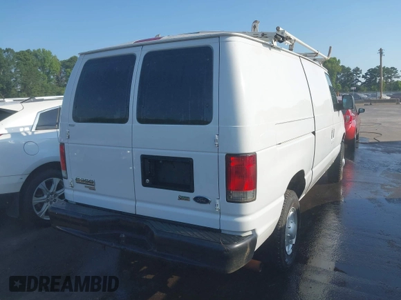 2014 Ford Econoline Cargo Commercial with VIN 1FTSE3EL9EDA49034, listed as a IAAI auction lot 42679719 with 217,659 mi miles and . Bid and sale history available at DreamBid. Image 4.