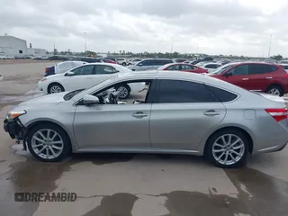 2015 Toyota Avalon Limited with VIN 4T1BK1EB2FU149980, listed as a IAAI auction lot 41897411 with 136,507 mi miles and . Bid and sale history available at DreamBid. Image 15.